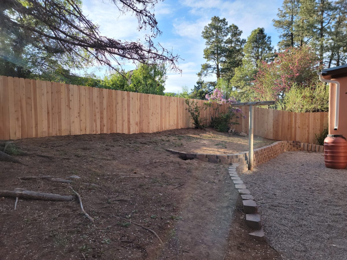Cedar privacy with retaining wall